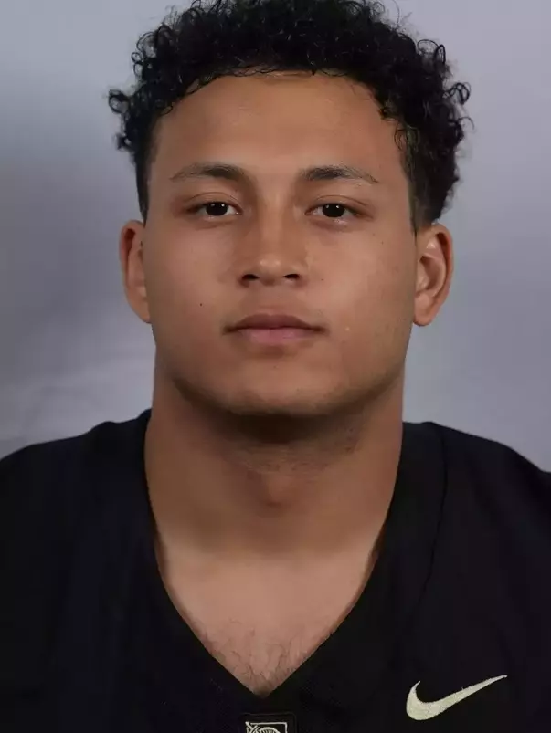 Chris Williams headshot with a Black Army Football jersey on.