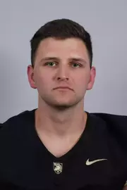 Cooper Allen headshot with a Black Army Football jersey on.