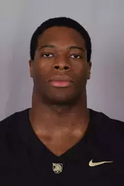 Demani Stewart headshot with a Black Army Football jersey on.