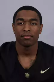 Devan Moss headshot with a Black Army Football jersey on.