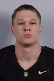 Grayson Baker headshot with a Black Army Football jersey on.