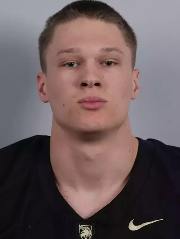Grayson Baker headshot with a Black Army Football jersey on.