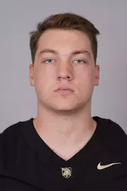 Greg Meidl headshot with a Black Army Football jersey on.