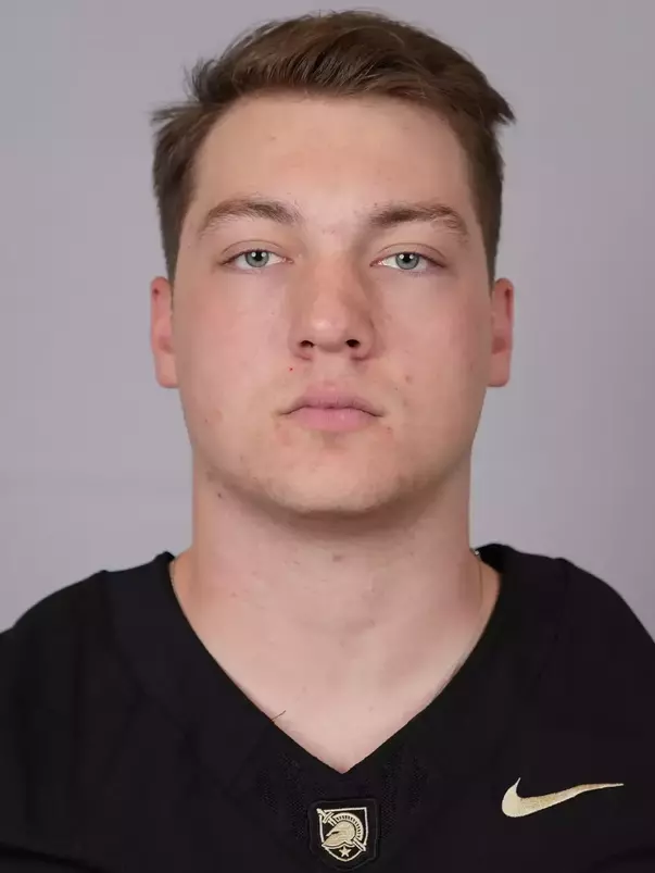 Greg Meidl headshot with a Black Army Football jersey on.