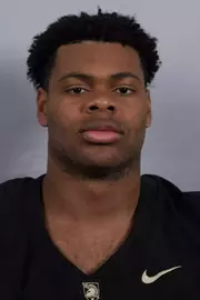 Isaiah Birl headshot with a Black Army Football jersey on.