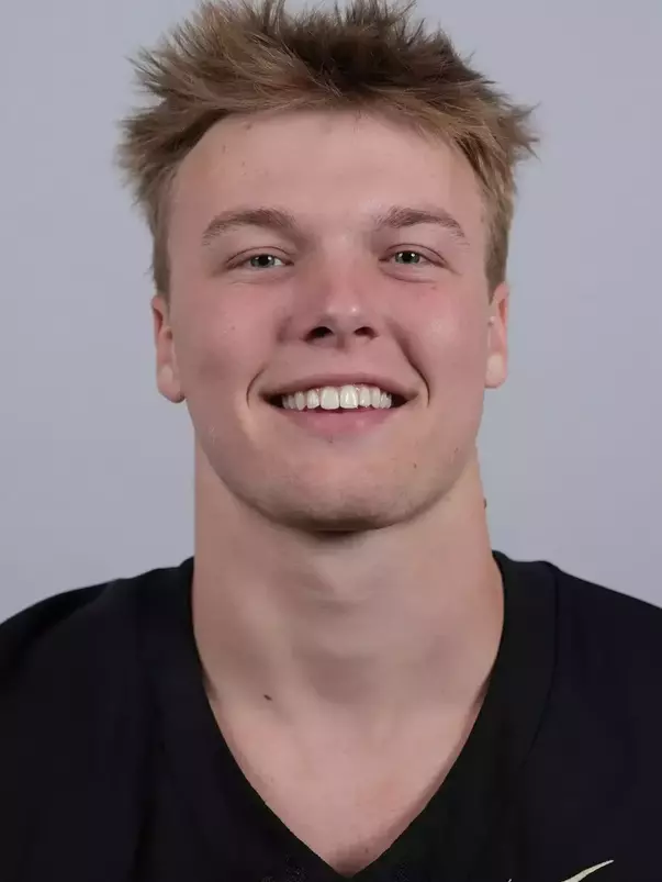 Jack Bousum headshot with a Black Army Football jersey on.