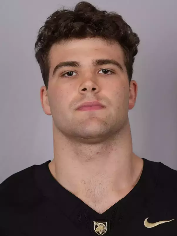 Jacob Cotterill headshot with a Black Army Football jersey on.