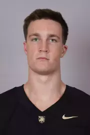 Jacob Hinton headshot with a Black Army Football jersey on.
