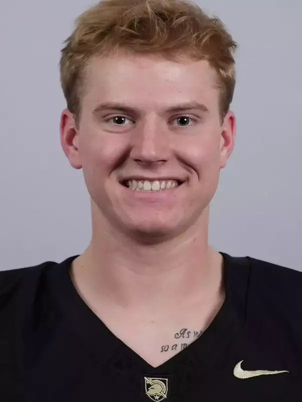 Jake Hulstien headshot with a Black Army Football jersey on.