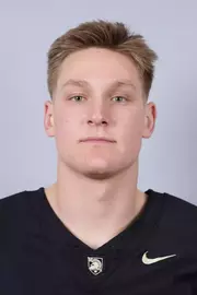 James Rothstien headshot with a Black Army Football jersey on.
