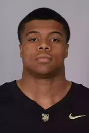 Jacquavius Moss headshot with a Black Army Football jersey on.