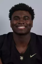 Javon Smith headshot with a Black Army Football jersey on.