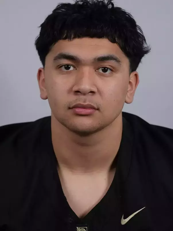 Jonah Zimmerman headshot with a Black Army Football jersey on.