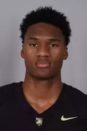 Julian Porter headshot with a Black Army Football jersey on.