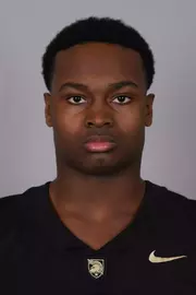 Kayvion Freeman headshot with a Black Army Football jersey on.