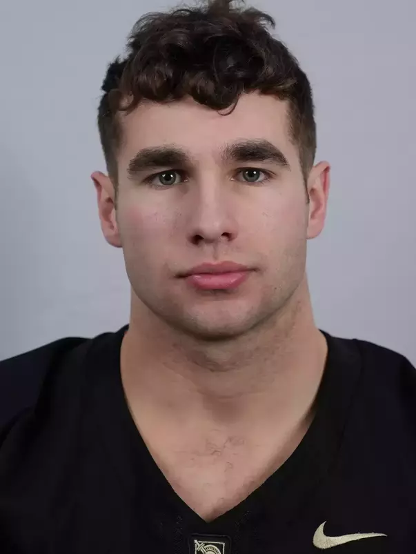 Khaled Waliagha headshot with a Black Army Football jersey on.