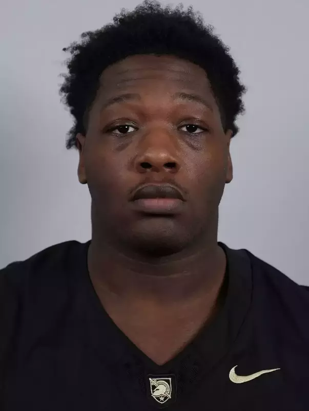 Kody-Harris Miller headshot with a Black Army Football jersey on.