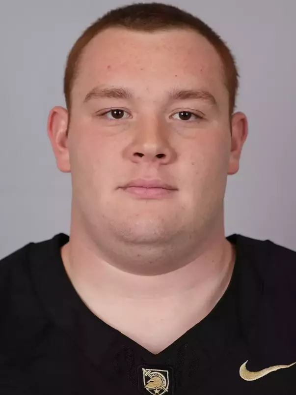 Kyle Baltazar headshot with a Black Army Football jersey on.