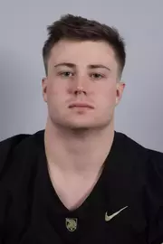 Mack O'Halloran headshot with a Black Army Football jersey on.