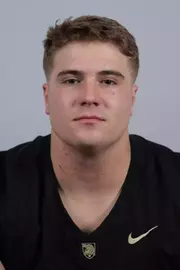 Matt Gemma headshot with a Black Army Football jersey on.