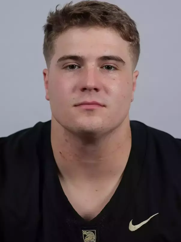 Matt Gemma headshot with a Black Army Football jersey on.