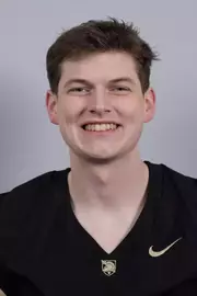 Mathew Faulk headshot with a Black Army Football jersey on.