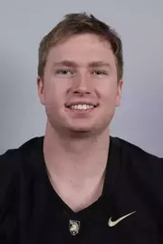 Max Stober headshot with a Black Army Football jersey on.