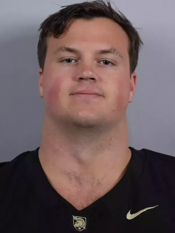 Ned Brady headshot with a Black Army Football jersey on.