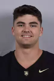 Noah Prior headshot with a Black Army Football jersey on.