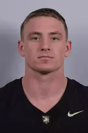 Owen Walter headshot with a Black Army Football jersey on.