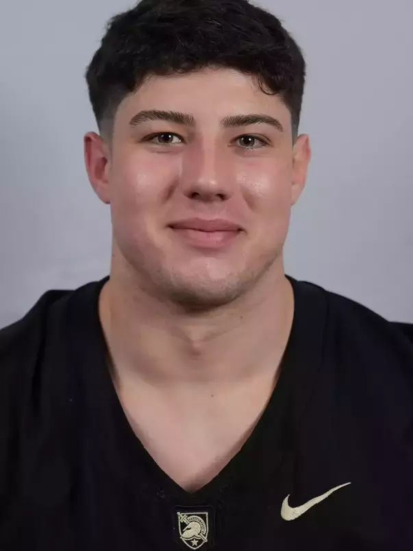 Sam Zagame headshot with a Black Army Football jersey on.