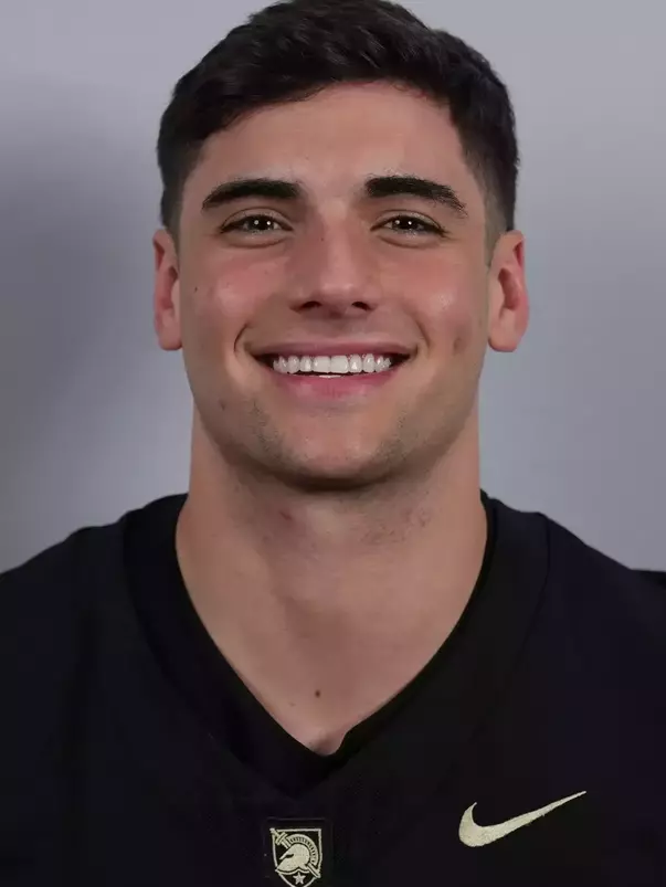 Sean Donovan headshot with a Black Army Football jersey on.