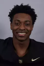 Stephen Nnadozie headshot with a Black Army Football jersey on.