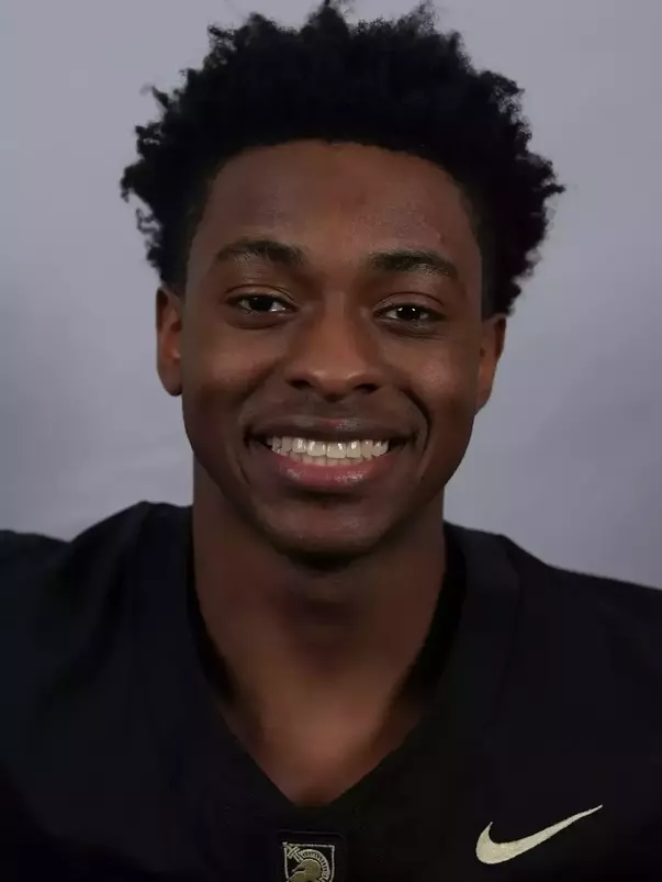 Stephen Nnadozie headshot with a Black Army Football jersey on.