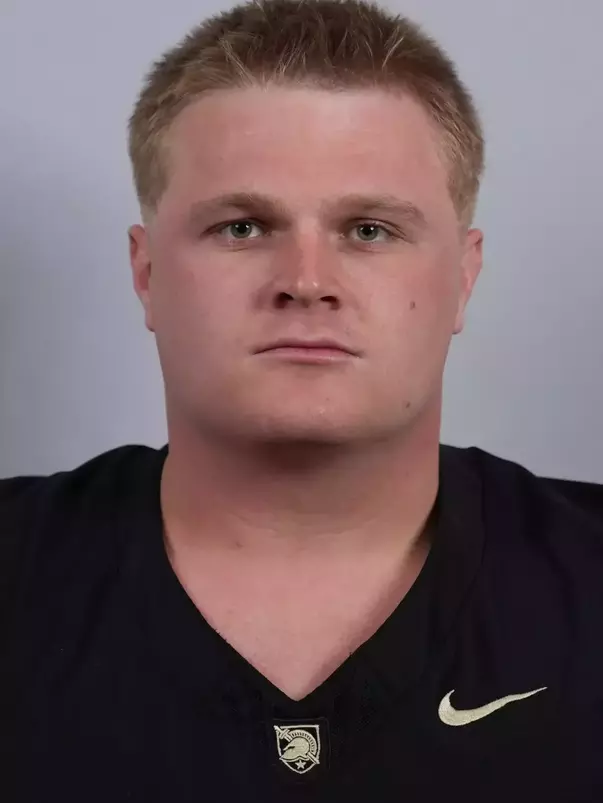 Tanner Bivins headshot with a Black Army Football jersey on.