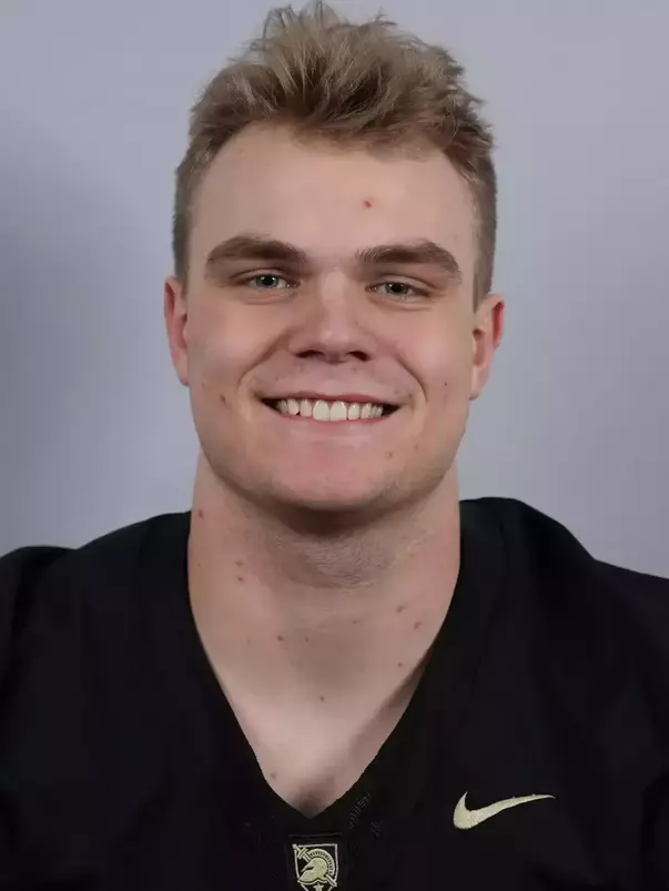 Teddy Williams headshot with a Black Army Football jersey on.