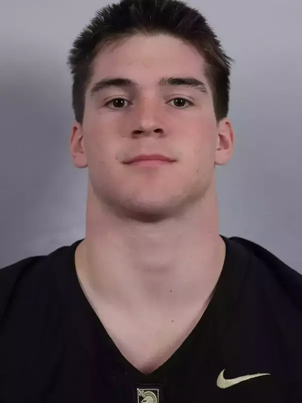 Tim Kloska headshot with a Black Army Football jersey on.