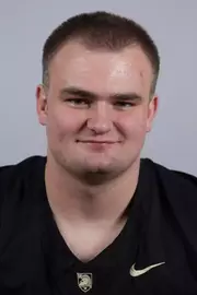 Will Jeffcoat headshot with a Black Army Football jersey on.