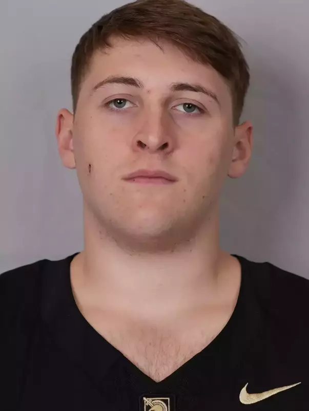 William Mack headshot with a Black Army Football jersey on.