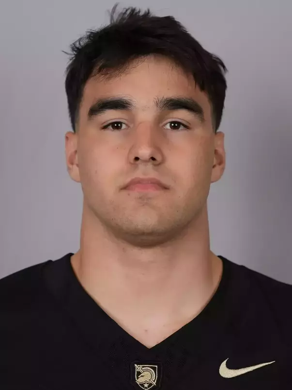 Zane Tallman headshot with a Black Army Football jersey on.
