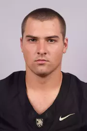 Jack Manning headshot with a Black Army Football jersey on.