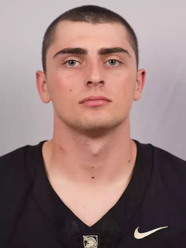 Charles Daly headshot with a Black Army Football jersey on.
