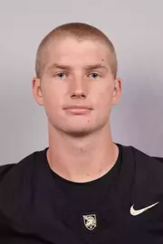 Landin Hoeppner headshot with a Black Army Football jersey on.