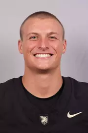 Stratton Fuller headshot with a Black Army Football jersey on.
