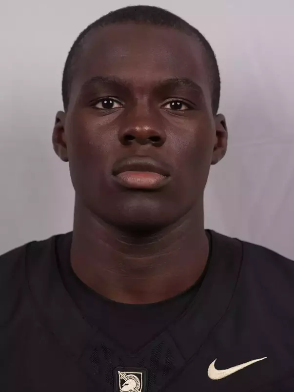 Andrew Afolabi headshot with a Black Army Football jersey on.