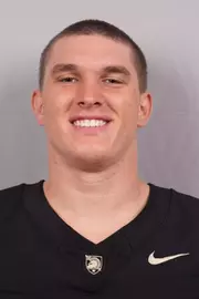 Blake Owen headshot with a Black Army Football jersey on.