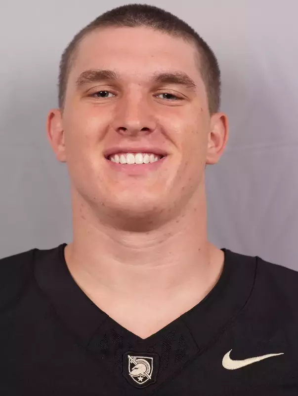 Blake Owen headshot with a Black Army Football jersey on.