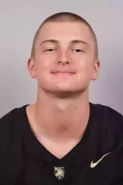 Max Penicie headshot with a Black Army Football jersey on.