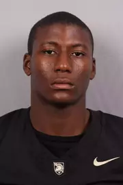 Brian Barton headshot with a Black Army Football jersey on.