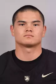 Nolan Johnson headshot with a Black Army Football jersey on.